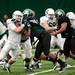 EMU defensive back Pudge Cotton plays on the offensive line during spring practice on Sunday, April 14. AnnArbor.com I Daniel Brenner
